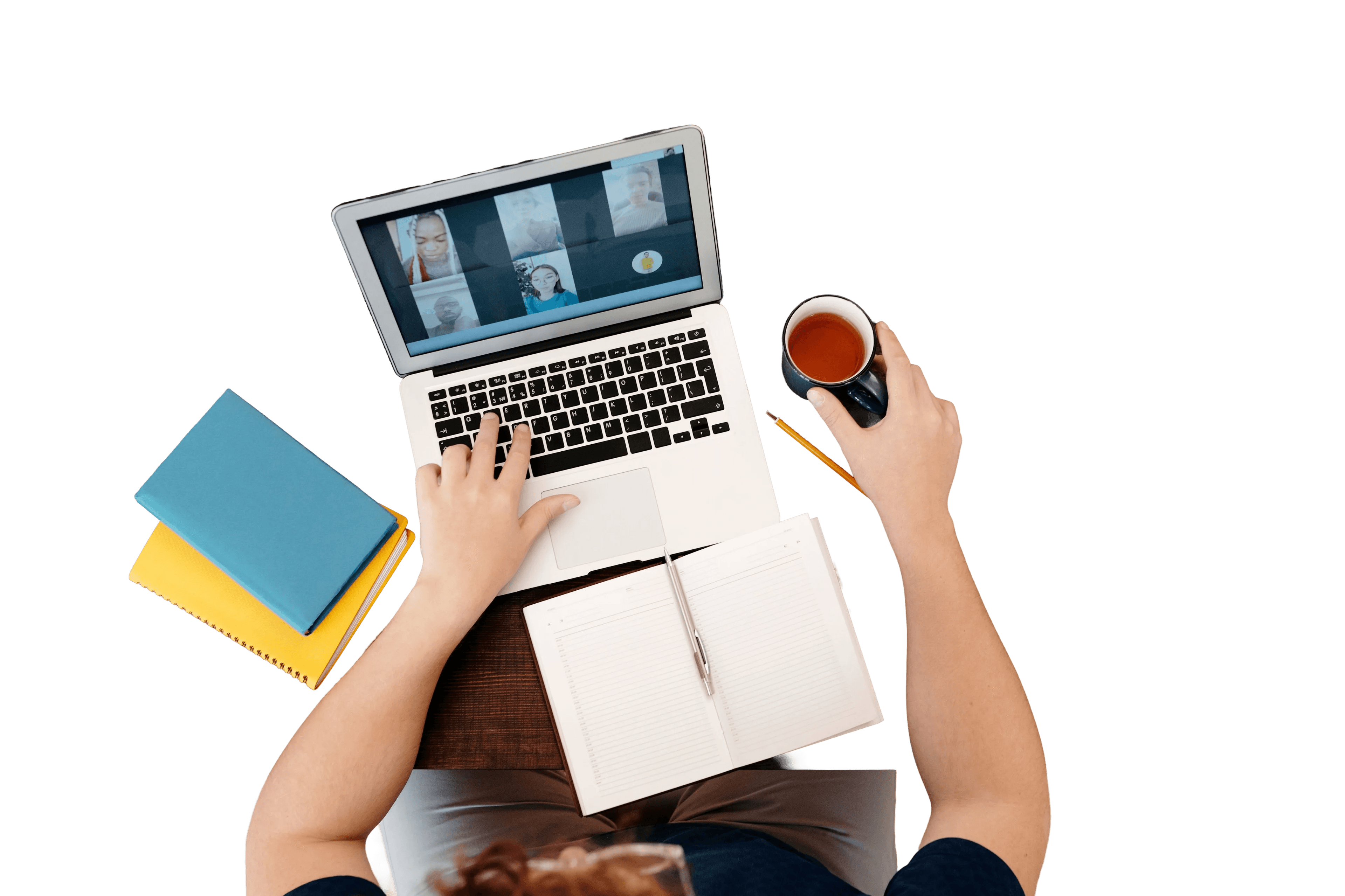 Learner working at a desk during an online class